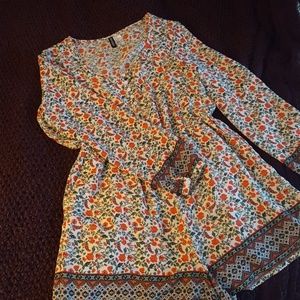 NWOT Orange and Cream Floral Romper from H&M